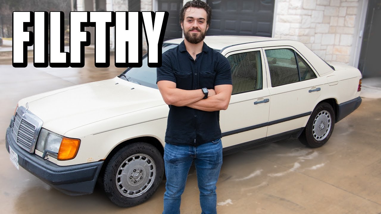 Chris DeDecker standing in front of his white Mercedes W124