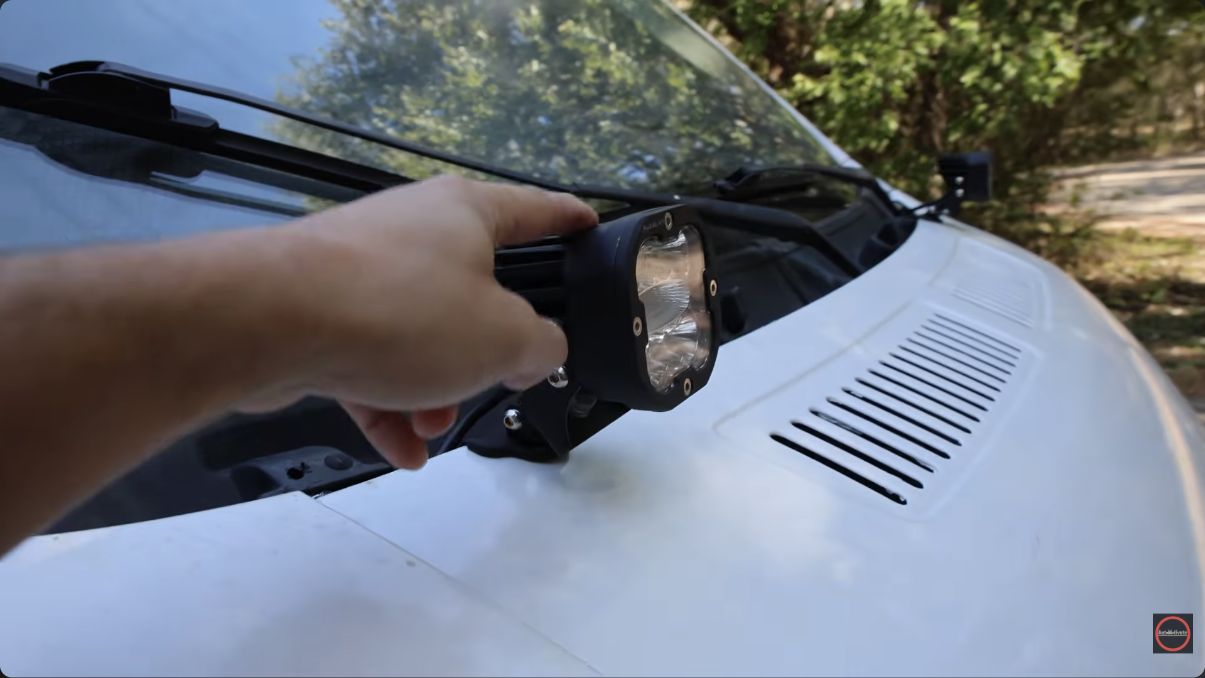 Auxbeam XP-Ultra pod mounted beside the windshield on Chris’s white van