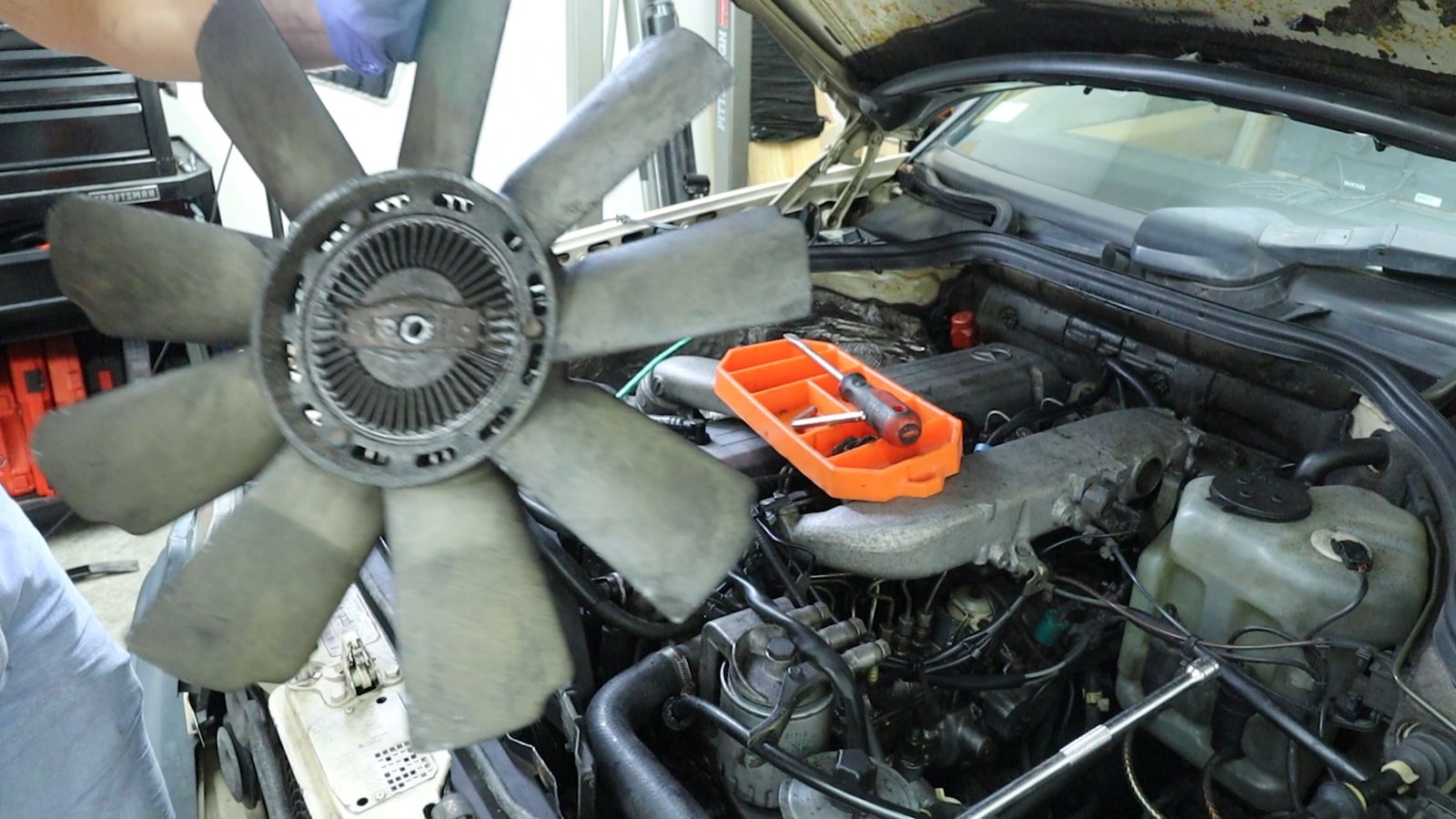 Removed radiator fan and fan clutch beside the Mercedes engine bay