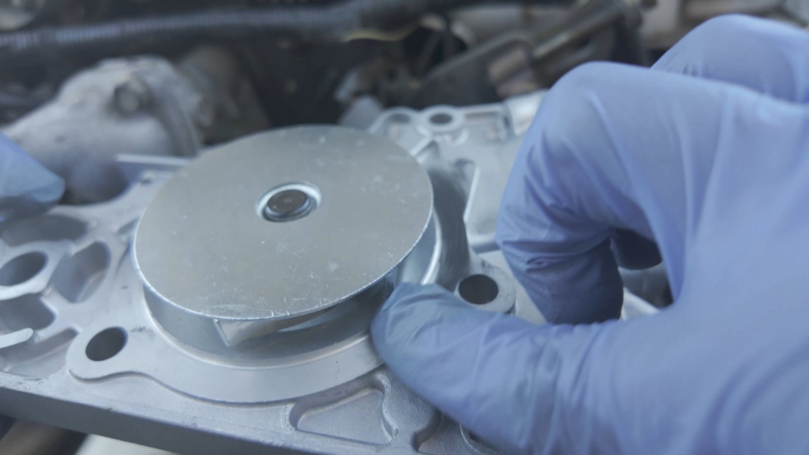 Close-up of the impeller side of a removed water pump